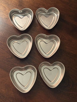 6 heart-shaped tins