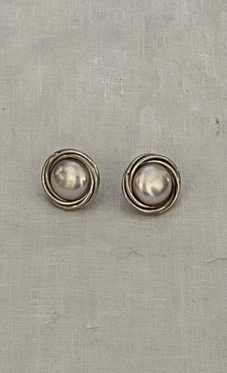 1990s round silver toned earrings .35”
