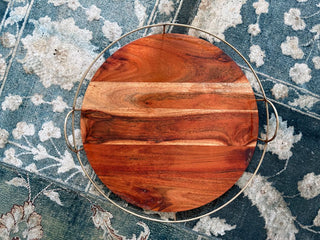 round brass and wood tray