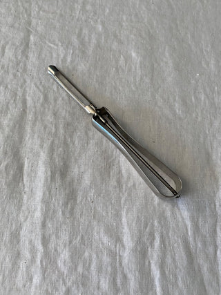 Vintage metal peeler made in Sweden 7”