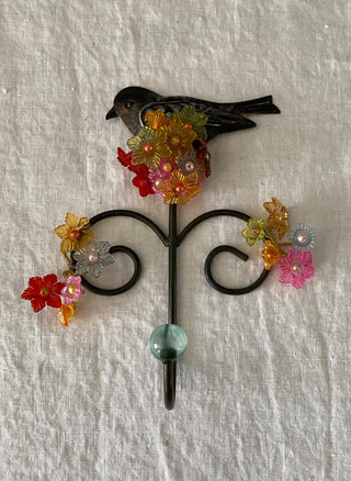 Vintage metal bird hook with flowers 7x8x2.5”