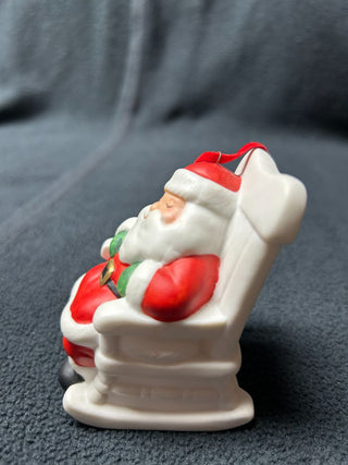 Santa sleeping on chair