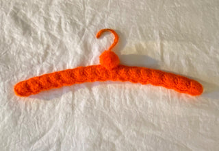 Vintage crocheted hanger orange