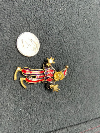 Black/red jester pin