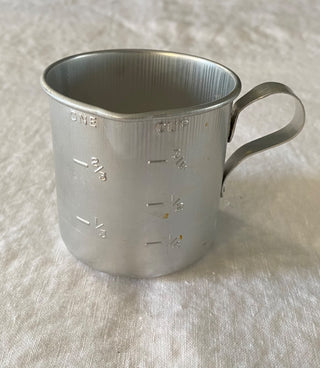 Vintage 1950s aluminum measuring cup