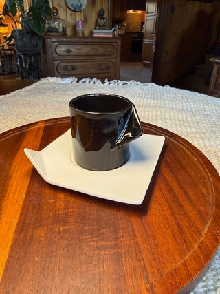 Black Ceramic Cup and White Saucer