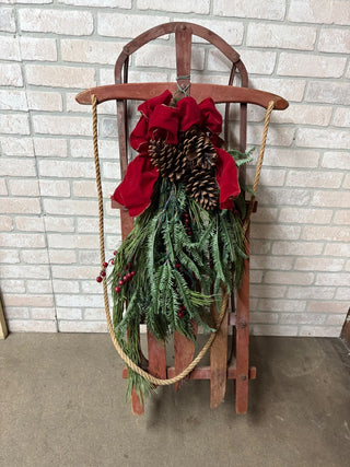 Old Red Sled with Christmas Greens Embellishment
