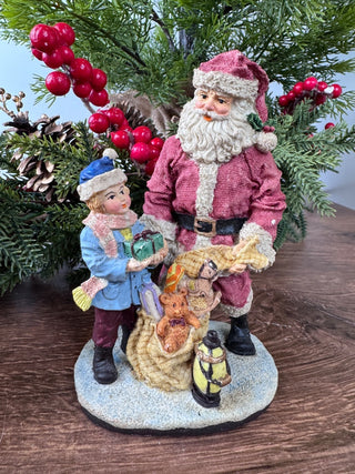 Santa with Toy Sack and Little Boy