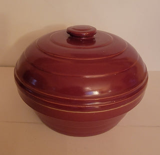 Red pottery stoneware covered casserole