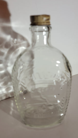 Log Cabin 1976 Liberty Bell bottle