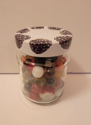 Jar of vintage marbles/berry top