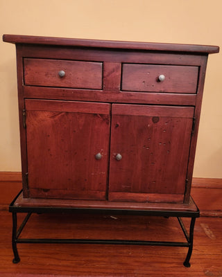 Small cabinet on iron stand (22x10x27)