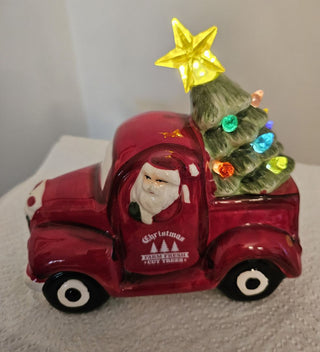 Light Up Ceramic Santa in Truck