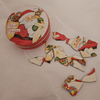 Vintage Santa Holding List Tin with Miniature Puzzle Inside