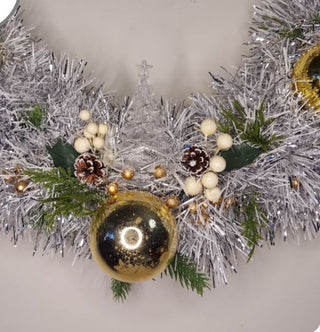 Midcentury mercury glass wreath with vintage gold ornaments, mistletoe and pine on silver, white tinsel
