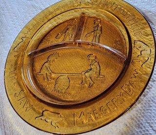 Vintage amber nursery rhyme plate embossed with See Saw Margery Daw