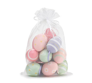 Assorted Easter egg ornaments in mesh bag with pastel colors and floral, polka dot, and stripe designs, JSQ Mercantile – a women’s boutique and gift shop in La Grange, IL.