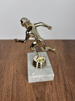 Woman running trophy