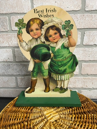 Boy and girl standing sign