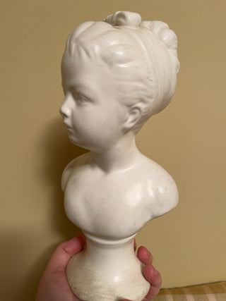 Bust with bow