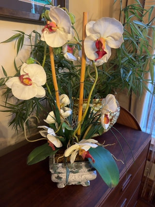 Vintage, artificial orchid arrangement