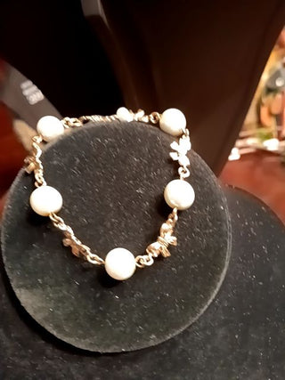 KJL Pearl/Bow Brace md. U.S.A.