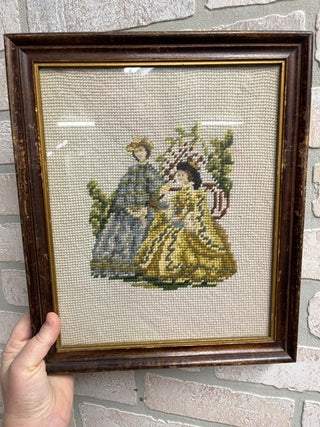 Two woman embroidery framed