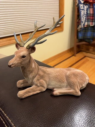 Velveteen stag sitting