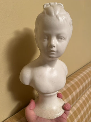 Bust with bow