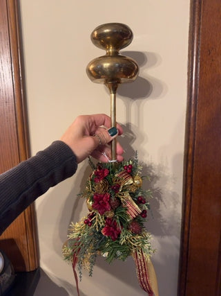 Vintage, brass candleholder with holiday decoration