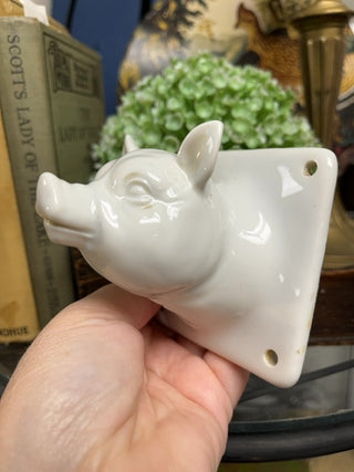 Ceramic pig wall hanging