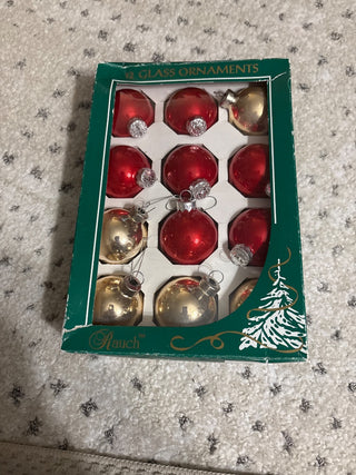 Red/gold glass ornaments.