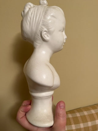 Bust with bow