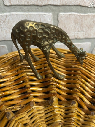 Brass giraffe bending