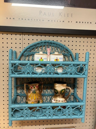 Blue wicker shelf