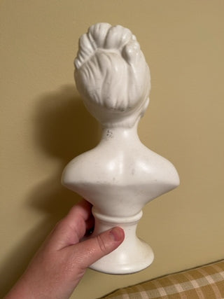 Bust with bow