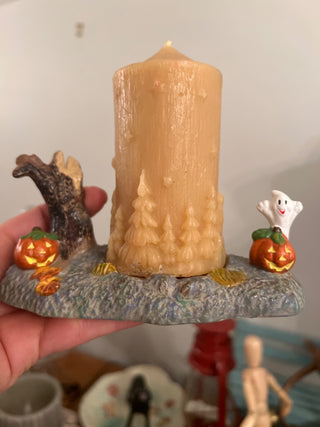 Ceramic Halloween scene with candle