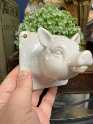 Ceramic pig wall hanging