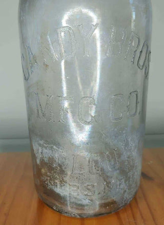 ANTIQUE CANDY BROTHERS MFG. CO. GLASS ADVERTISING JAR (4LBS)
