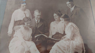 Edwardian Family Reading Together Photograph