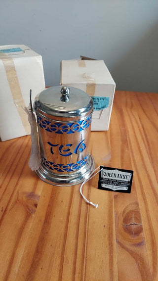 mid-century queen anne tea canister with silver spoon. brand new vintage stock.