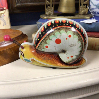 Snail tin toy, as is