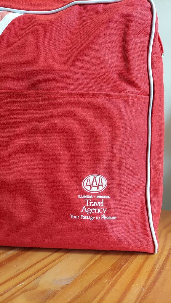 1980s AAA Red Travel Bag, Your Passage to Pleasure. made in Thailand for Customcraft Industries