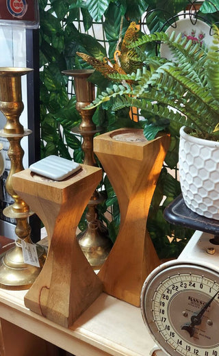 (2) Pair of twisting wood pedestal candle holders 10" & 12"