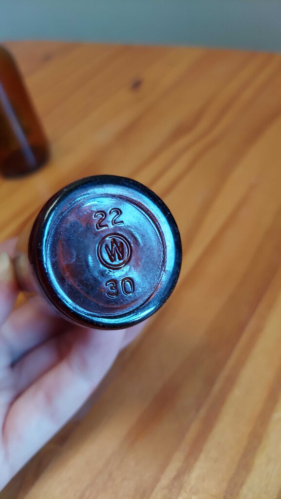 merck amber pharmaceutical bottle by Wheaton glass co, original metal MERCK screw cap