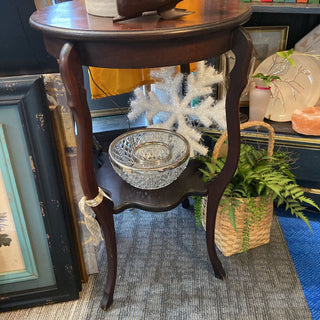 Round dark wood antique table