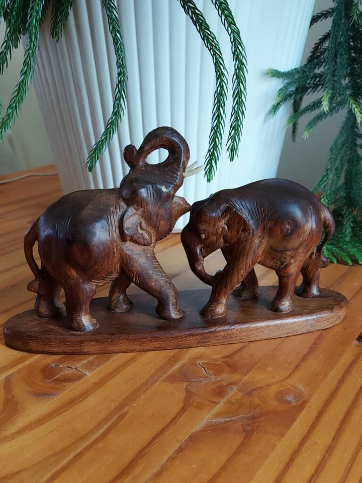 Vintage hand carved African Black Walnut Elephants with tusks