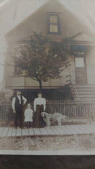 Edwardian family proudly showing home at "2048", two photos in bag, front and back