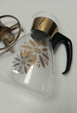 1961 Holiday Addition, Golden Poinsettia carafe with base - Pyrex USA (T&M)