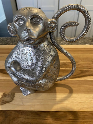 Introspective Silver Monkey Statue